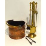 COPPER HELMET SHAPED COAL BUCKET WITH SWING HANDLE AND BRASS FIRESIDE COMPANION STAND WITH FOUR
