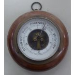 AN OAK CIRCULAR ANEROID BAROMETER AND A MAHOGANY FRAMED SMALL CIRCULAR ANEROID BAROMETER (2)