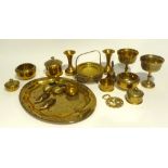 A QUANTITY OF BENARES BRASS AND OTHER BRASS ORNAMENTS AND A CIRCULAR BRASS TRAY