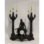MODERN MOULDED BLACK COMPOSITION THREE PIECE CLOCK GARNITURE, in the French taste, the clock with