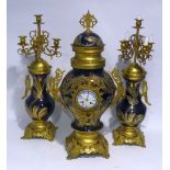 IMPRESSIVE TWENTIETH CENTURY GILT METAL AND BLUE PORCELAIN THREE PIECE CLOCK GARNITURE, the clock of