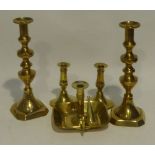 PAIR OF NINETEENTH CENTURY BRASS LARGE EJECTOR CANDLESTICKS, 12" (30.5cm) high, TOGETHER WITH A