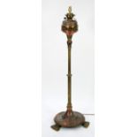 VICTORIAN EMBOSSED COPPER AND BRASS FLOOR STANDING OIL LAMP, the top with foliate scroll pierced