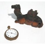 AGED CARVED WOOD RECUMBENT CAMEL PATTERN INKWELL AND COVER, with glass liner, 5" (12.7cm) long,