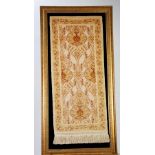 A MODERN ANATOLIAN (HEREKE) SMALL SILK RUG, 26 1/2" x 20 1/2" (67.5 cm x 52 cm), together with