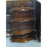 VICTORIAN MAHOGANY SET OF WALL DISPLAY SHELVES, FOUR TIER AND GRADUATED WITH SERPENTINE FRONTS (A.