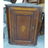 GEORGE III OAK AND MAHOGANY CROSSBANDED MURAL CORNER CUPBOARD, WITH OVAL FAN MARQUETRY INLAY, CANTED