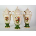 SUITE OF THREE 'ENGLISH ALTON MAKE' POTTERY TWO HANDLED PEDESTAL VASES, with covers, each with