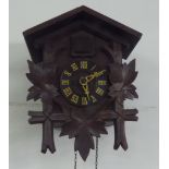 CONTINENTAL CARVED WOOD MURAL CUCKOO CLOCK