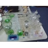 A QUANTITY OF CUT, MOULDED AND PLAIN GLASS INCLUDING; DECANTERS, DRINKING GLASSES, SUNDAE DISHES