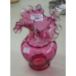 CRANBERRY GLASS VASE, WITH GRILLE TOP, 8 1/4" HIGH