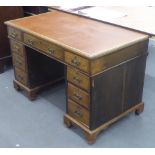 AN EDWARDIAN OAK DOUBLE PEDESTAL DESK