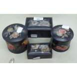 TWO ORIENTAL BLACK LACQUERED AND DRAGON DECORATED GRADUATED OBLONG BOXES AND TWO CIRCULAR BLACK