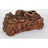 EARLY 20TH CENTURY CONTINENTAL CARVED WALNUTWOOD RUSTIC BOX in the form of a fallen tree trunk the