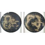 PAIR OF ORIENTAL GOLD THREAD ON BLACK SILK STUMP WORK CIRCULAR PANELS, each depicting a snarling