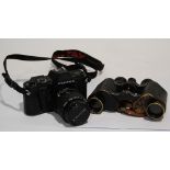 A LEATHER CASED PAIR OF THOMAS ARMSTRONG & BROTHER (Manchester & Liverpool) binoculars, and a PENTAX