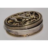 ANTIQUE MIDDLE EASTERN PLATED METAL OVAL SNUFF BOX the hinged lid applied with a cast open work