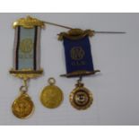 A 9CT GOLD ORDER OF THE BUFFALO PENDANDT 6.2 gms, and another inscribed 'Justice, Truth,