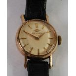 LADY'S MOVADO SWISS 9ct GOLD WRIST WATCH, with 17 jewel movement, small circular silvered dial