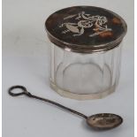 GEORGE V CRAFT MADE SILVER SPOON, with circular bowl and wire pattern handle with loop top, 4 3/