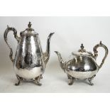VICTORIAN SILVER COFFEE POT OF PEAR-SHAPE with foliated scroll handle, curved spout and foliate cast