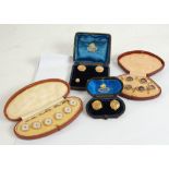 CASED SET OF SIX EARLY 20th CENTURY GOLD COLOURED METAL AND MOTHER OF PEARL DRESS STUDS; another