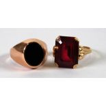 CONTINENTAL GOLD COLOURED METAL RING set with a large oblong red stone (Mark 14K) and a gents