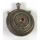 MIDDLE EASTERN SILVER COLOURED METAL MOON FLASK for perfume, the front set with centre red stone the