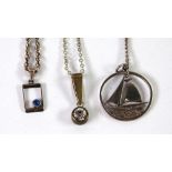 THREE SILVER COLOURED METAL CHAIN NECKLACES with pendants, two stone set and one yacht pattern (3)