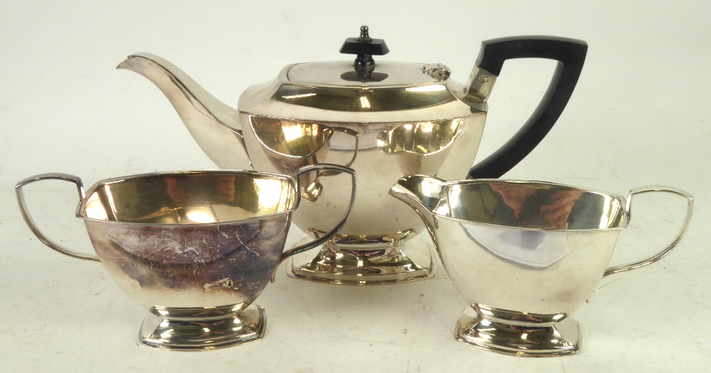 AN ELECTROPLATE TEA SERVICE OF 3 PIECES, of plain rounded oblong and tapering form and raised on