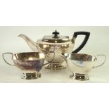 AN ELECTROPLATE TEA SERVICE OF 3 PIECES, of plain rounded oblong and tapering form and raised on