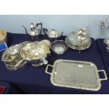 AN ELECTROPLATED FOUR PIECE TEA AND COFFEE SERVICE, an oblong two handled TEA TRAY, an oval ditto,