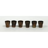 A SET OF SIX FRENCH NINETEENTH CENTURY SILVER COLOURED METAL SMALL LIQUEUR BEAKERS, with reed,