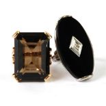 14K GOLD SMOKY QUARTZ SET RING and a 10K WHITE GOLD BLACK ONYX RING centrally set with a tiny