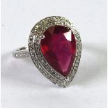 14ct WHITE GOLD, RUBY AND DIAMOND RING, set with a large pear shaped ruby, approx 7.50ct and stepped