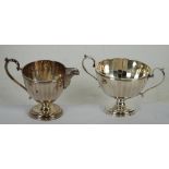 EARLY 20th CENTURY SILVER PEDESTAL TWO HANDLED SUGAR BASIN of panelled circular shape, with matching