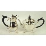 ELECTROPLATED TEAPOT by James Deakin, of circular form with cyma border, black scroll handle and