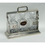 20th CENTURY ELECTROPLATED TANTALUS with three cut glass square decanters