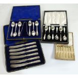 CASED SET OF SIX SILVER TEASPOONS WITH SUGAR TONGS, Sheffield 1904; another cased SET OF SIX