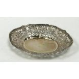 CONTINENTAL PIERCED SILVER COLOURED METAL BON BON DISH, stamped 800, of oval form with floral