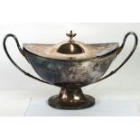 AN ELECTROPLATE LARGE AND ELEGANT TWO HANDLED SOUP TUREEN and DOMED COVER, the cover with urn