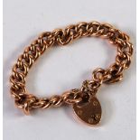 15CT GOLD BRACELET with hollow curb pattern link and padlock clasp, 22.4 gms