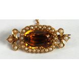 LATE VICTORIAN/EDWARDIAN UNMARKED GOLD, probably citrine and seed pearl set BROOCH with safety