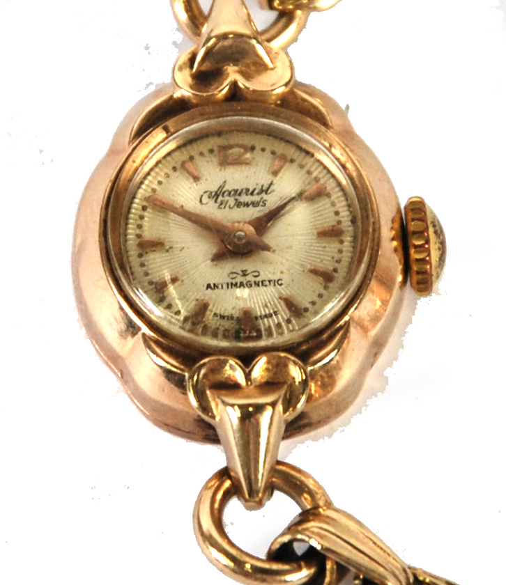 LADY'S ACCURIST 9ct GOLD SWISS WRIST WATCH, with 21 jewel movement, small circular dial with batons,