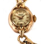 LADY'S ACCURIST 9ct GOLD SWISS WRIST WATCH, with 21 jewel movement, small circular dial with batons,