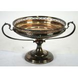A SILVER CIRCULAR TWO HANDLED PEDESTAL CAKE DISH, with pierced gallery border, on knopped column and
