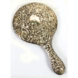 EDWARD VII EMBOSSED SILVER CASED HAND MIRROR, with circular bevel edged plate, decorated with