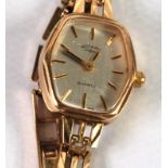 LADY'S ROTARY SWISS 9CT GOLD QUARTZ WRIST WATCH, the silvered hexagonal dial with batons and