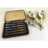 THREE PIECE SILVER AND GUILLOCHE ENAMELLED DRESSING TABLE BRUSH SET, decorated with blue flowers