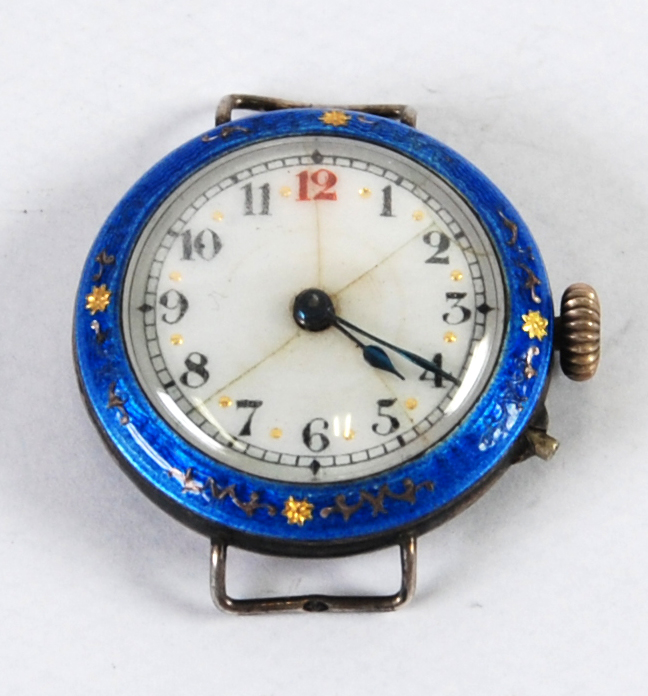 LADY'S EARLY 20th CENTURY SILVER WRISTWATCH with mechanical movement, white porcelain arabic dial,